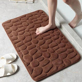 The bathroom is a soft and comfortable viscoelastic carpet with pebble relief, quick water absorption, washable, non slip, 1 piece