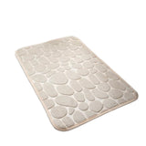 The bathroom is a soft and comfortable viscoelastic carpet with pebble relief, quick water absorption, washable, non slip, 1 piece
