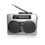 Dual speaker stereo retro cassette player cassette player listening to AM FM radio
