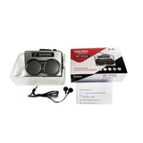 Dual speaker stereo retro cassette player cassette player listening to AM FM radio
