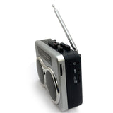 Dual speaker stereo retro cassette player cassette player listening to AM FM radio