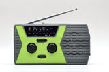 Solar powered hand charging NOAA radio with flashlight reading light in the United States