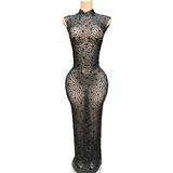 A sexy long dress with new style that is not transparent full of diamonds. It has a sleeveless and buttocks wrapped around the waist