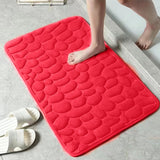 The bathroom is a soft and comfortable viscoelastic carpet with pebble relief, quick water absorption, washable, non slip, 1 piece