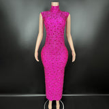 A sexy long dress with new style that is not transparent full of diamonds. It has a sleeveless and buttocks wrapped around the waist
