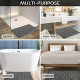 The bathroom is a soft and comfortable viscoelastic carpet with pebble relief, quick water absorption, washable, non slip, 1 piece